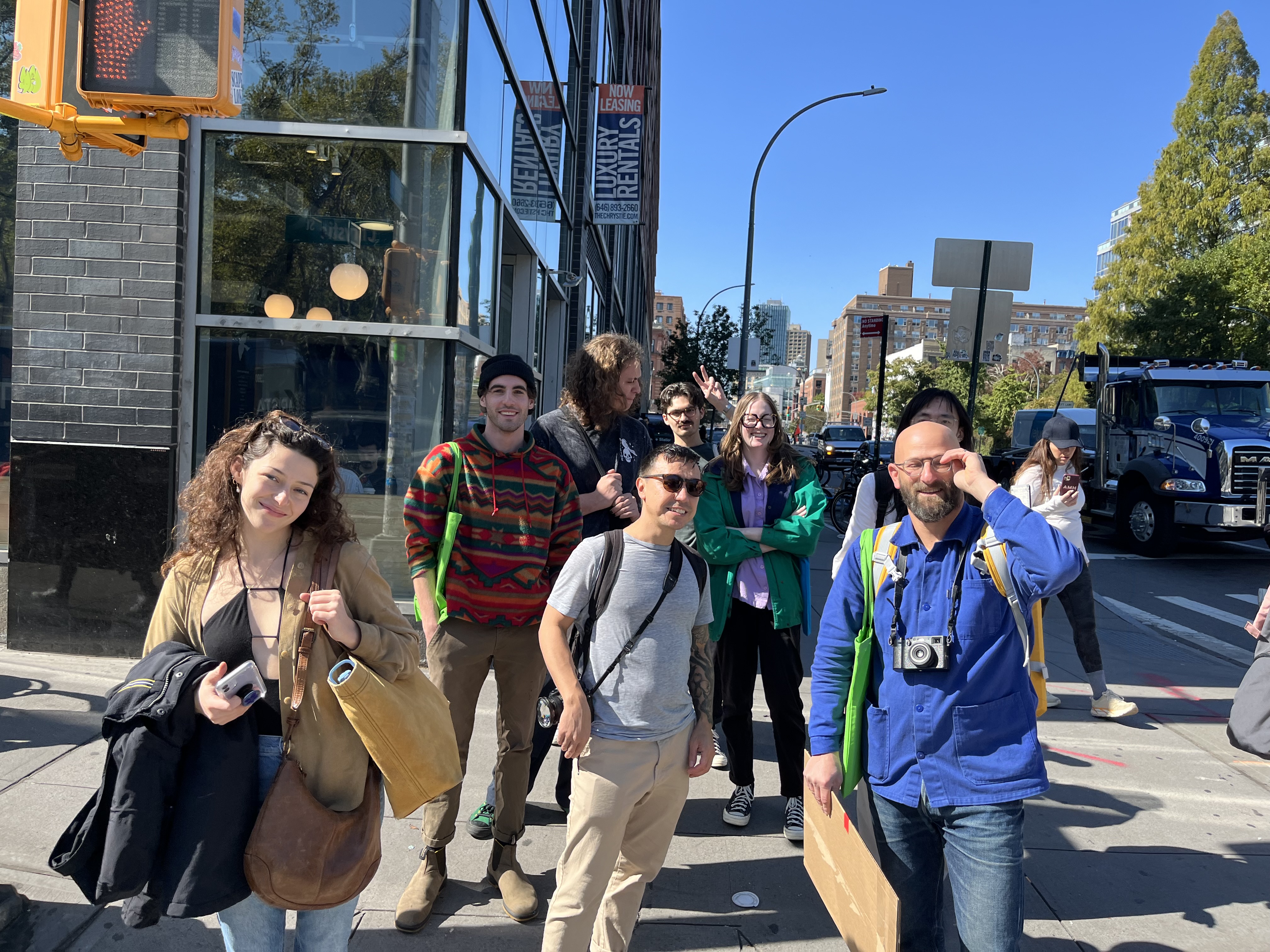 A group of RIT photography students and faculty walking the streets of New York City.