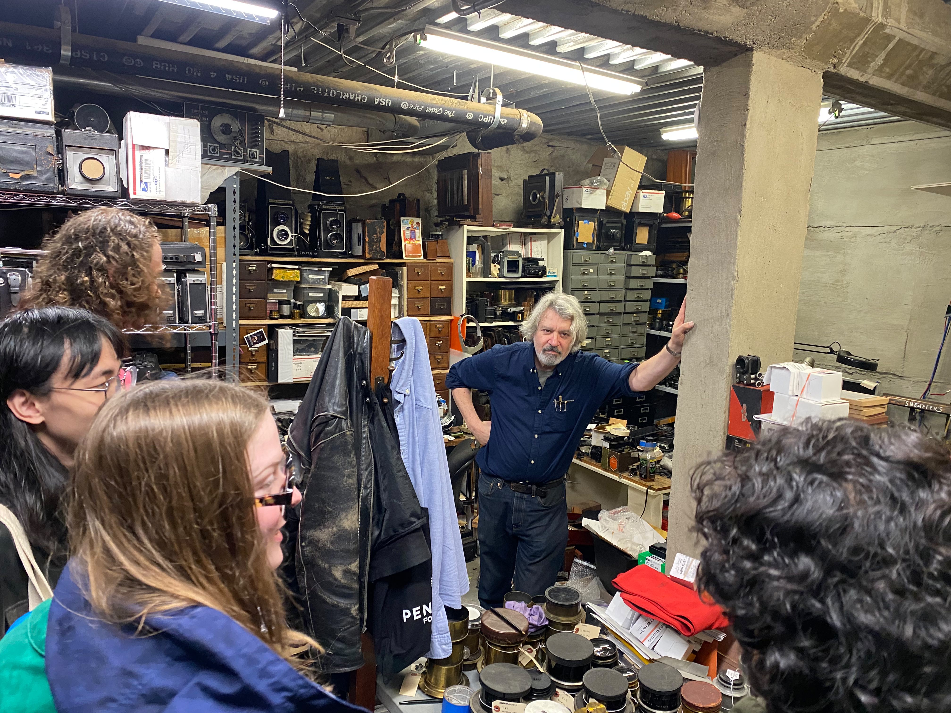 Geoffrey Berliner in the basement of Penumbra Foundation shows off a treasure trove of 19th century camera gear.