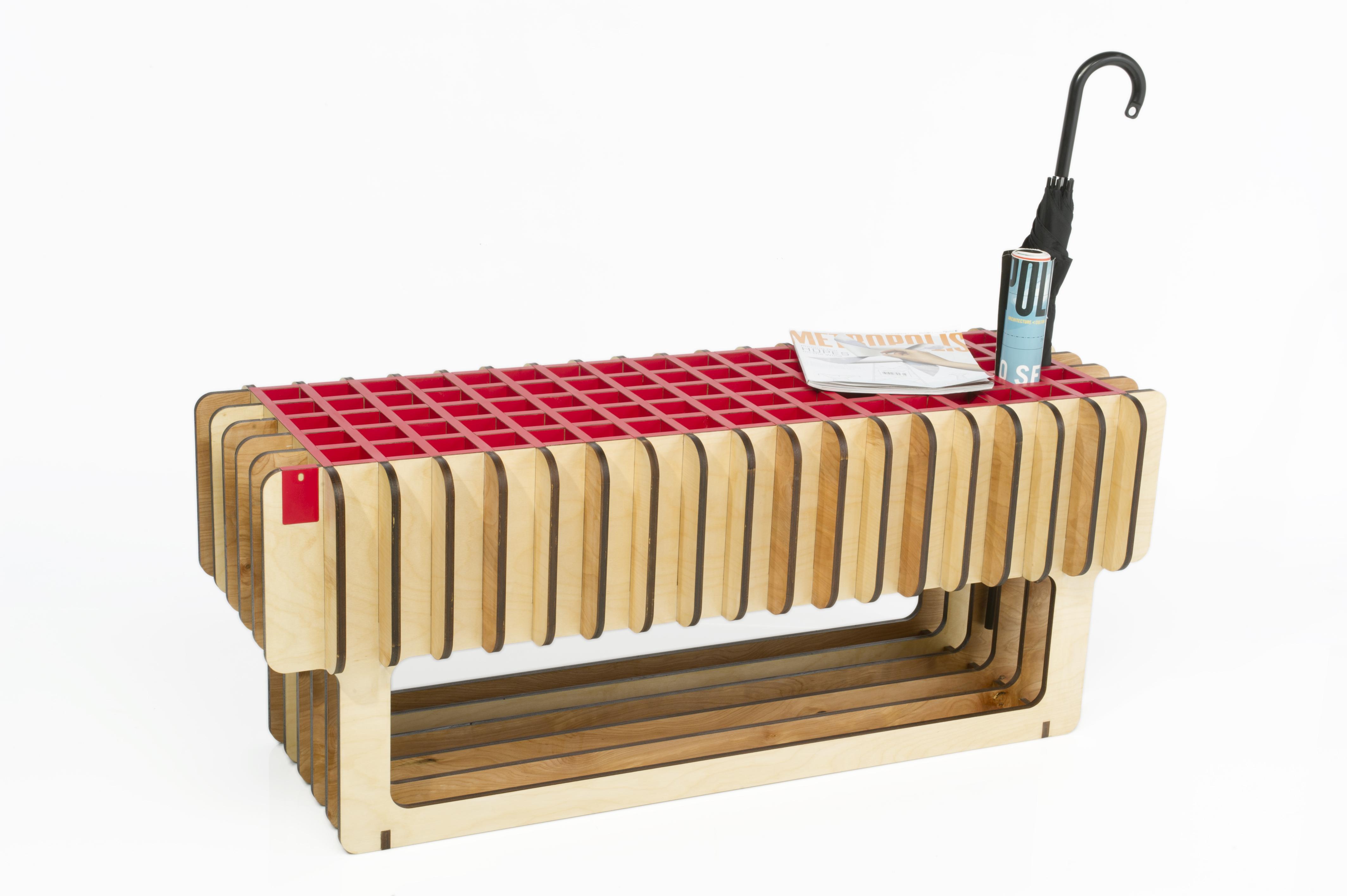 A bench with holes to store items like umbrellas.