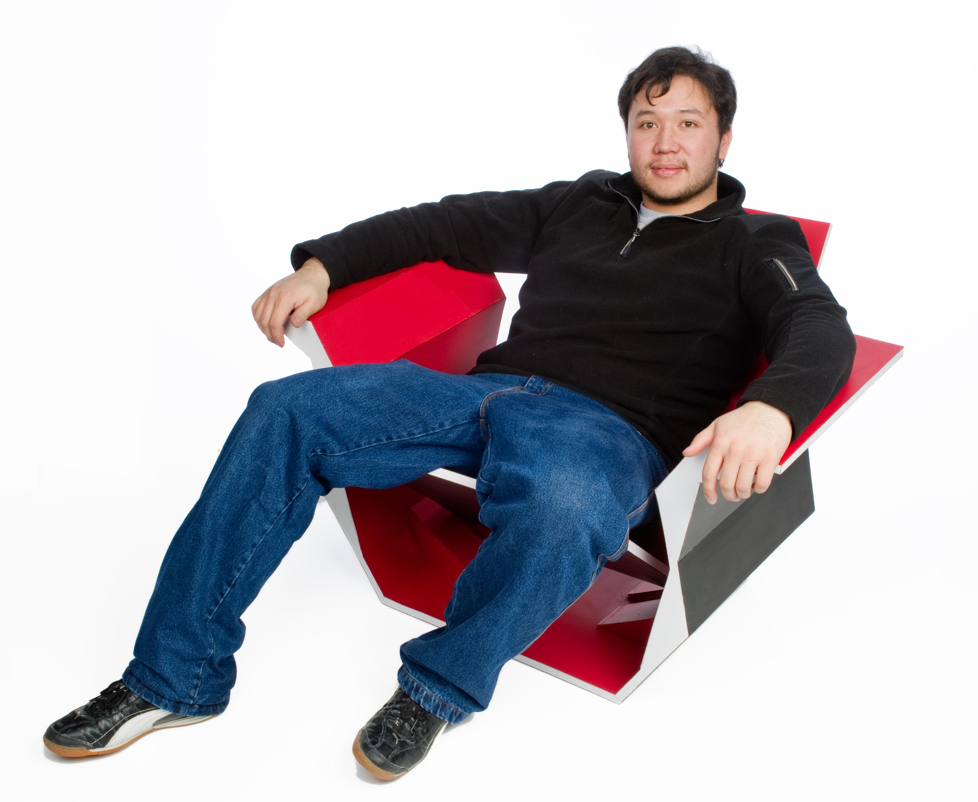 A person reclines in a chair.
