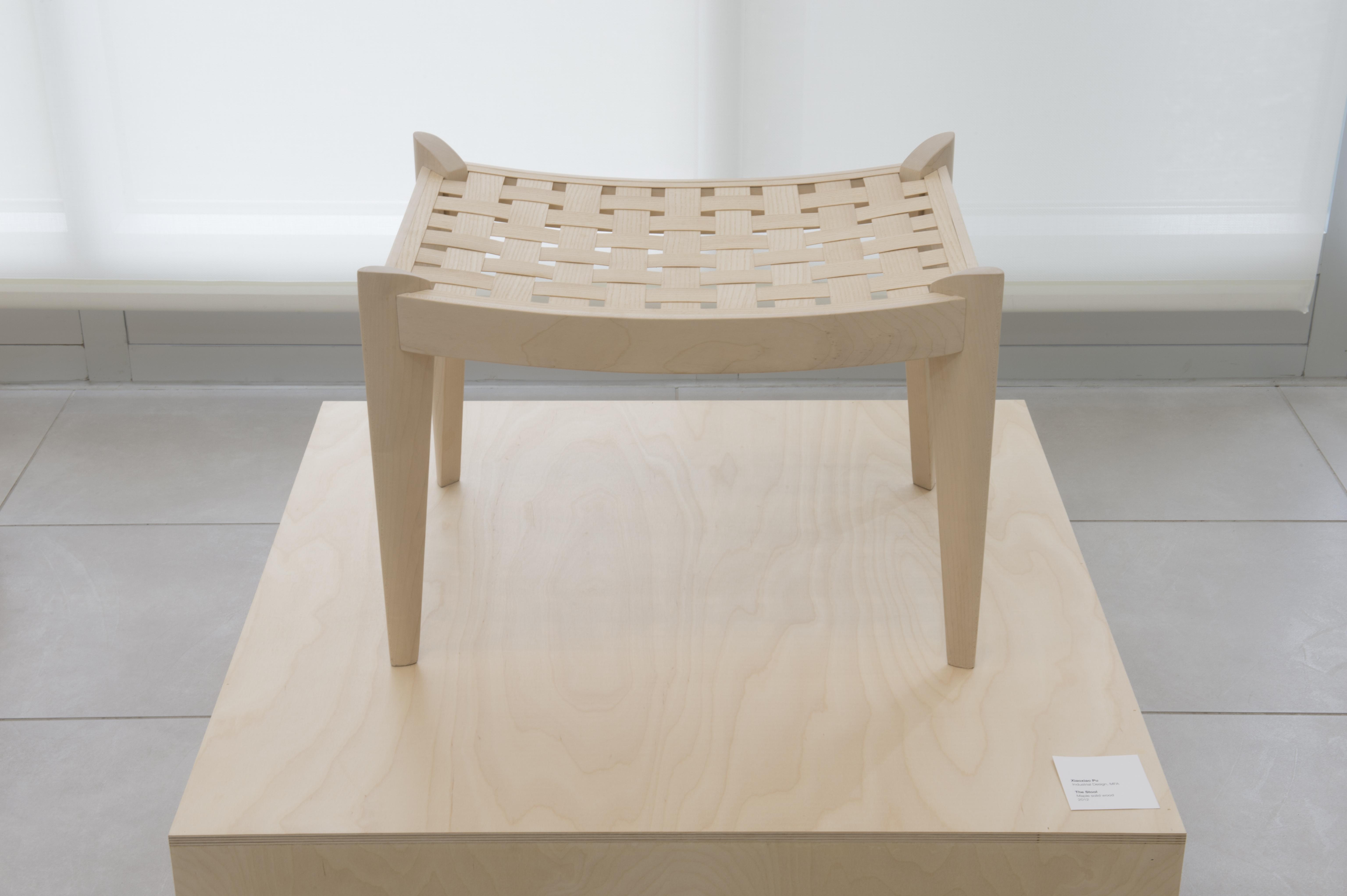 A table on display in University Gallery.