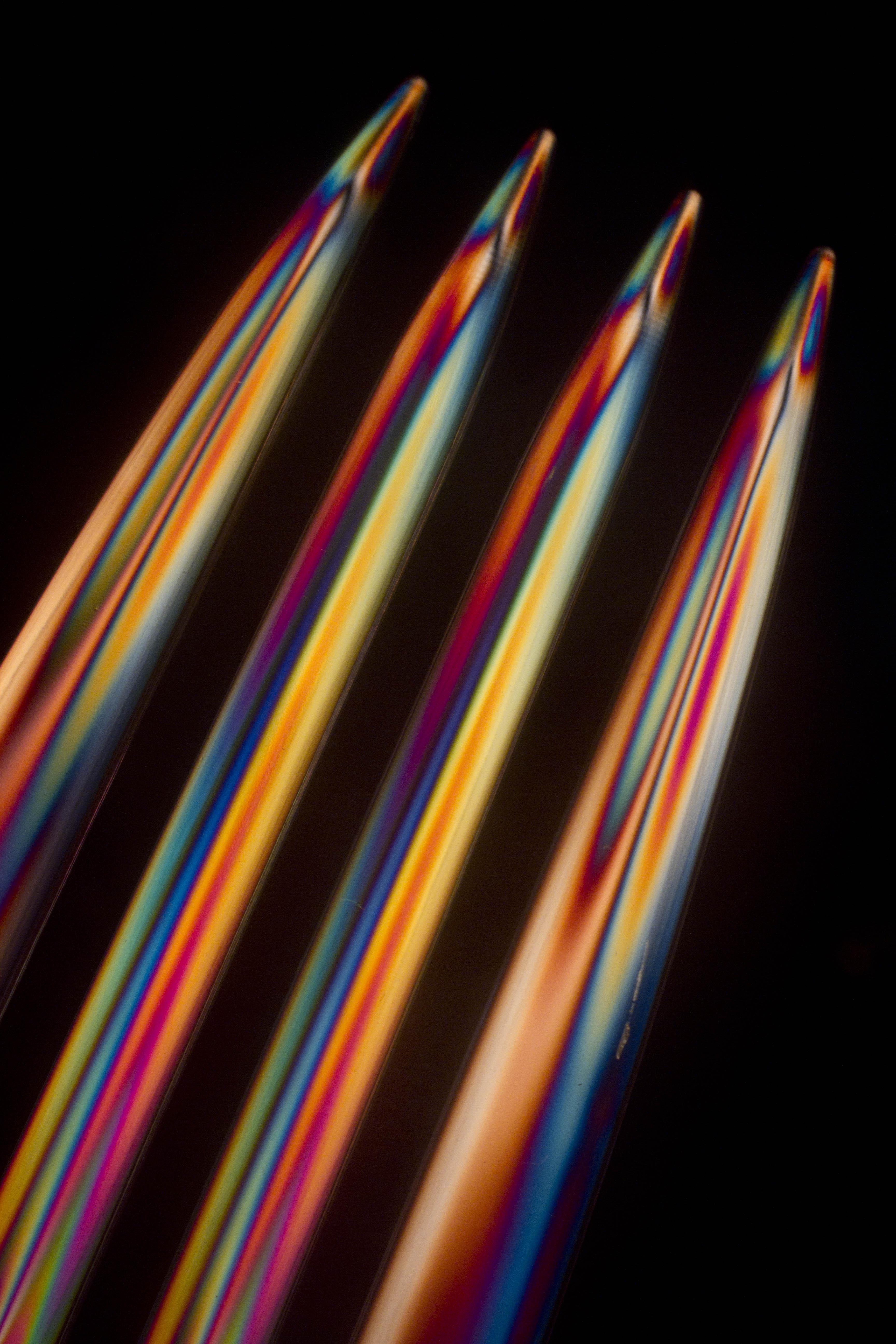 A photo of a four rainbow-colored streaks.