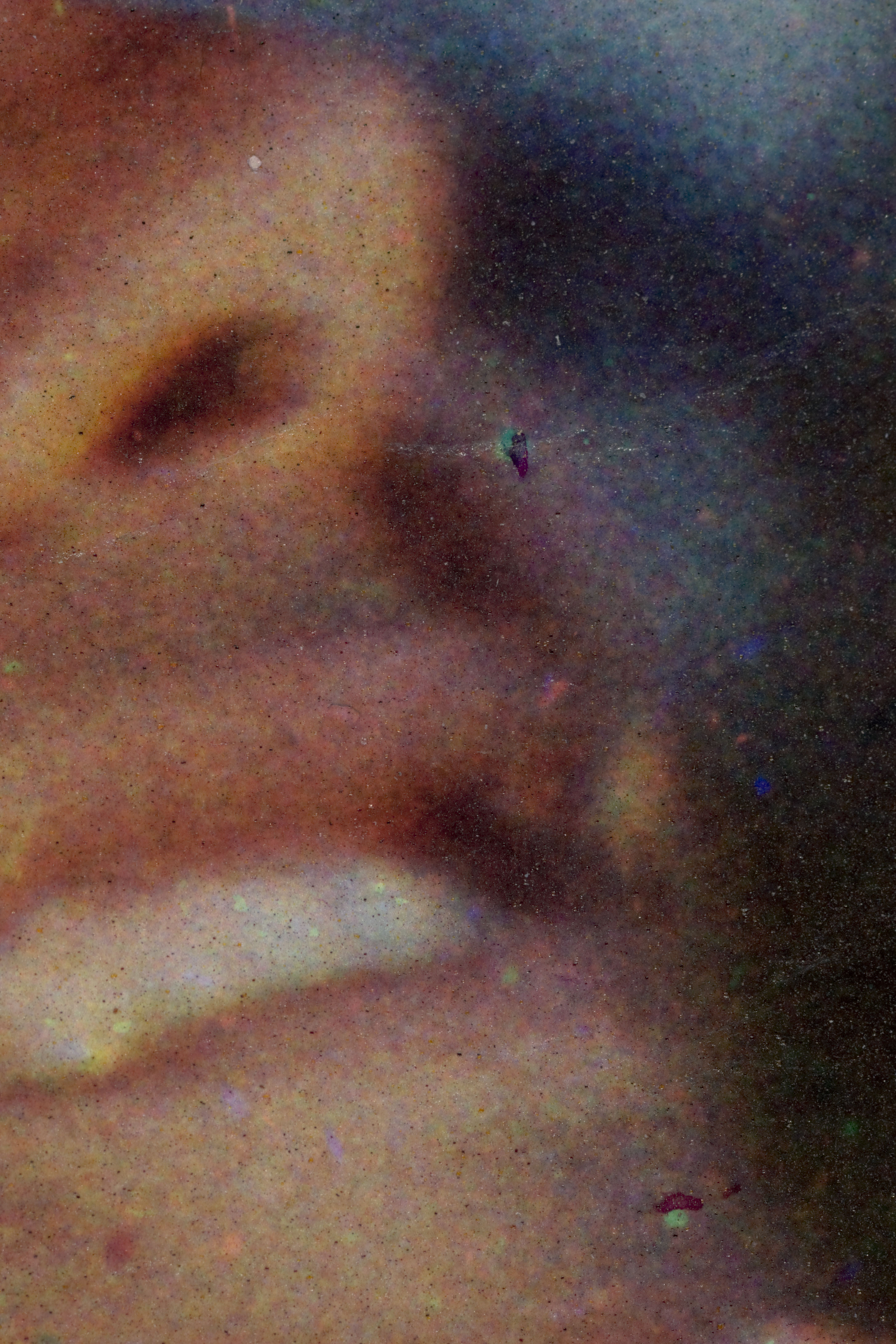 Pigment particles are slightly visible at 10x magnification.