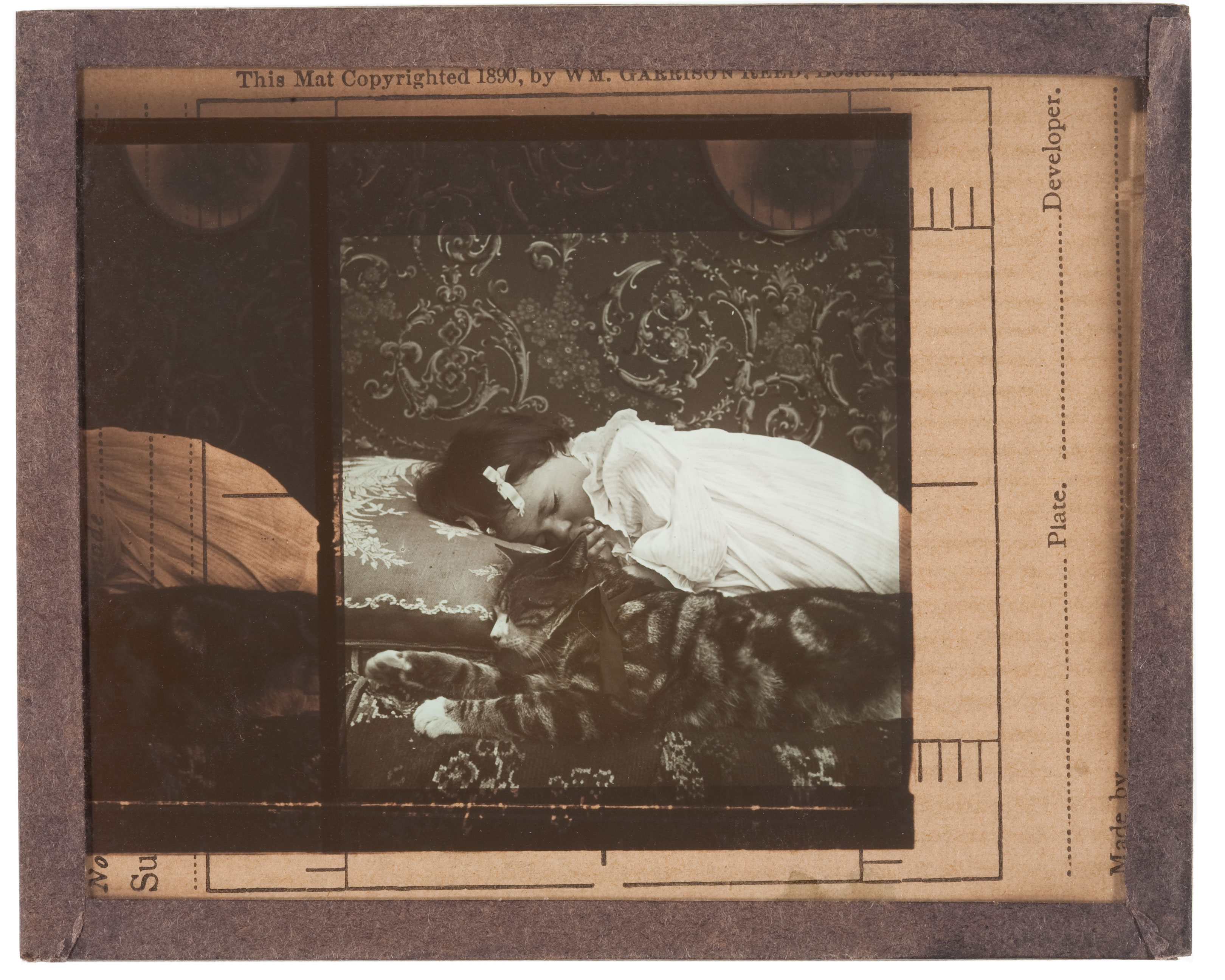 The mat was sometimes used as a mask. This image was originally taken as a stereoview but reproduced as a lantern slide. 