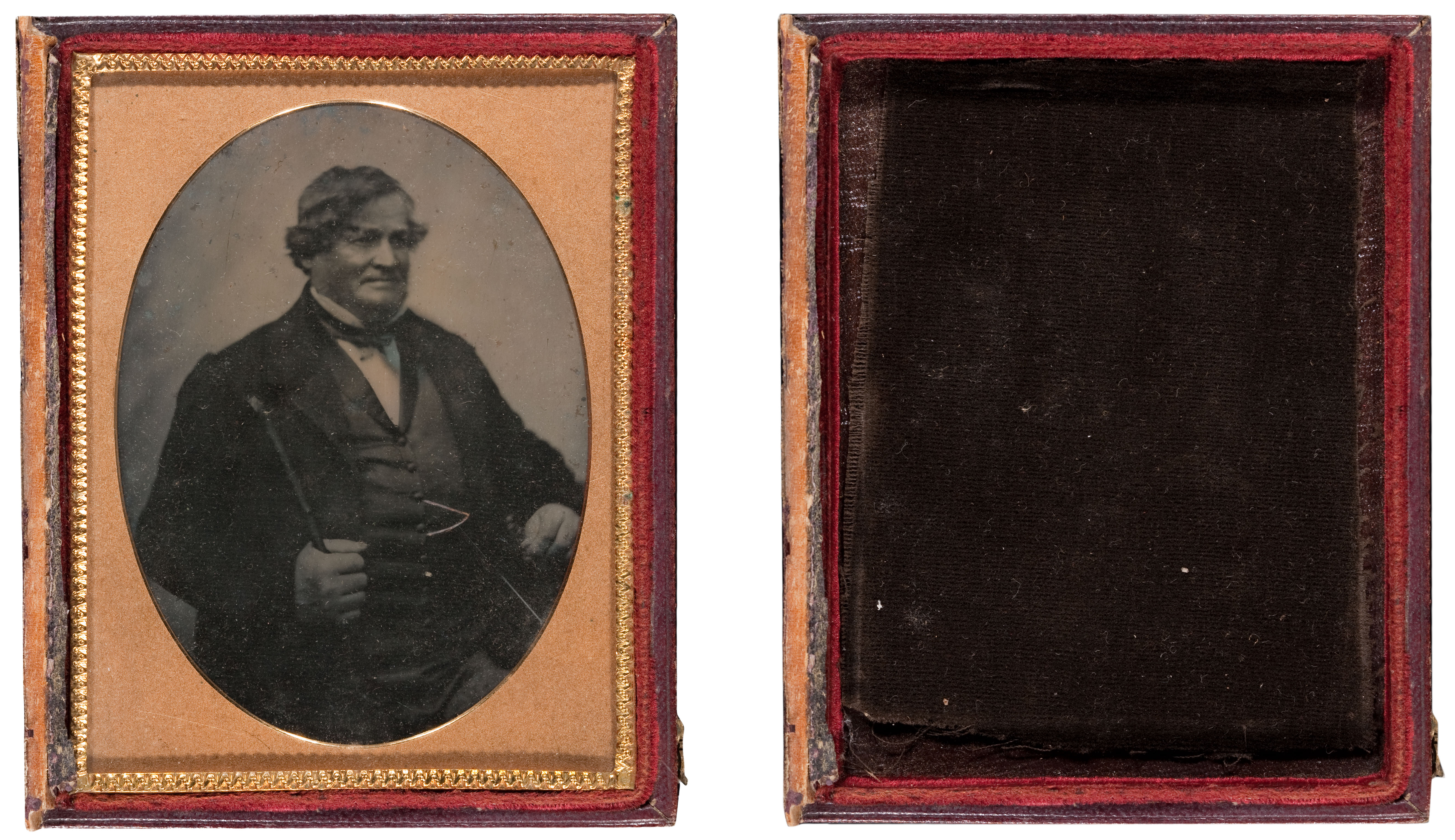 Dark cloth was placed behind this image to make it appear positive. The same object with the plate removed from the case is shown on the right. Dark velvet cloth is lining the case tray. 